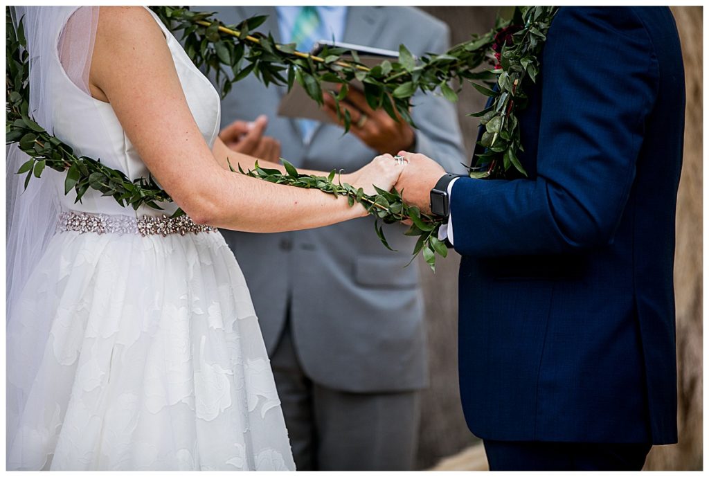 ceremony with greenery lasso