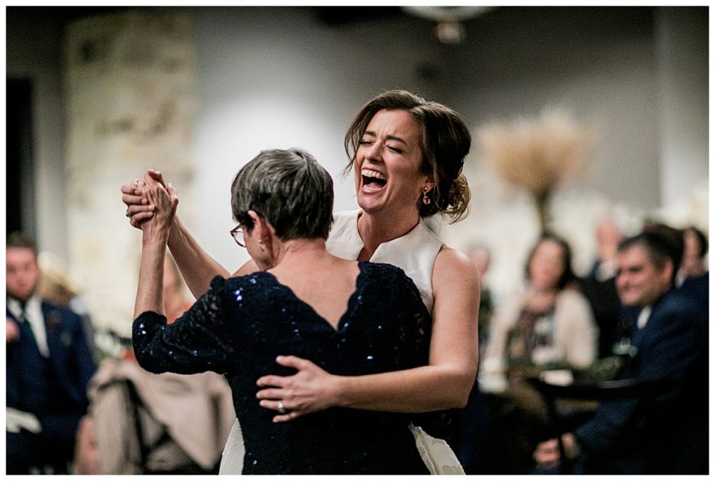 bride and mom dance