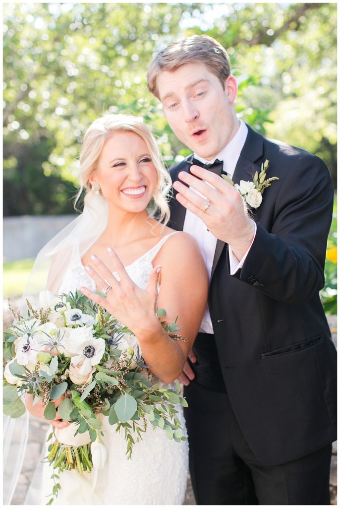 bride and groom just married with rings