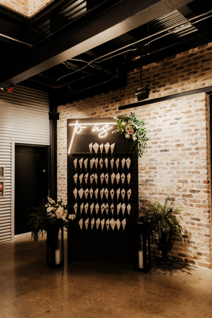 brownie wall with neon sign 