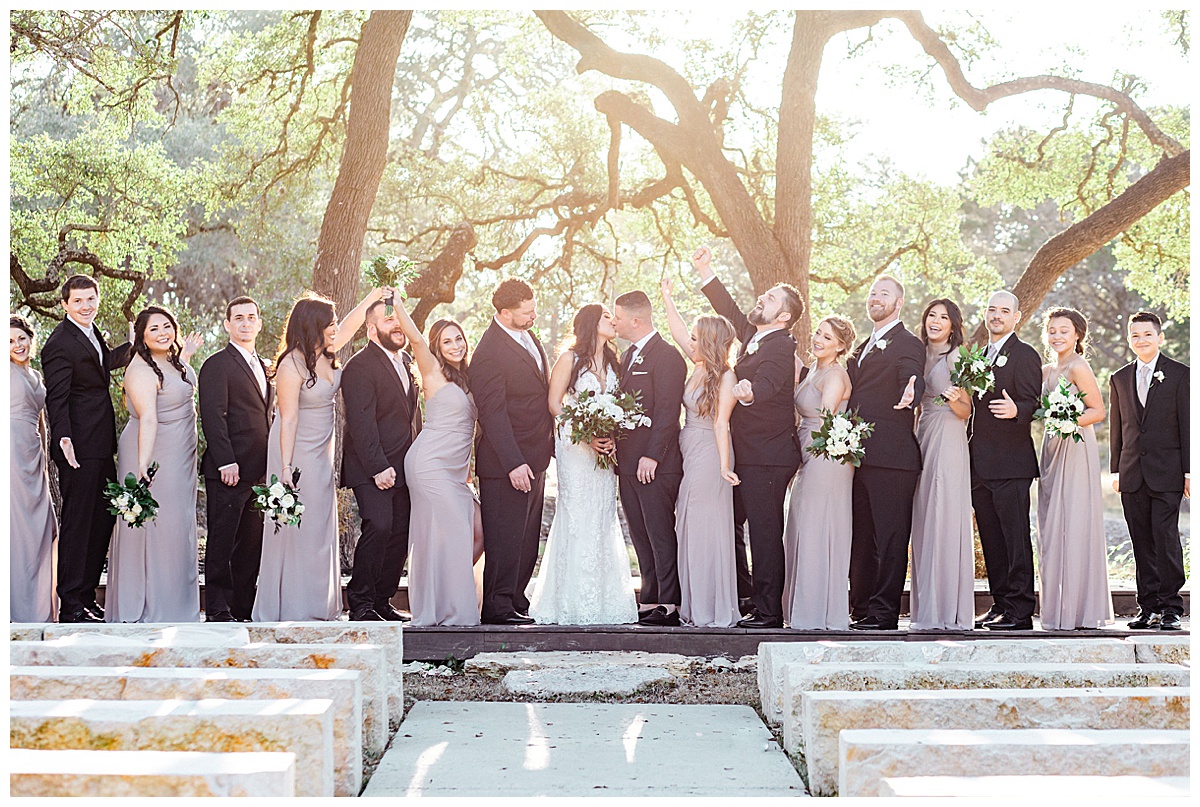 bridal party standing together in Dripping Springs venue