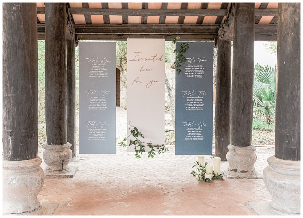 hanging seating chart in multiple shades of blue